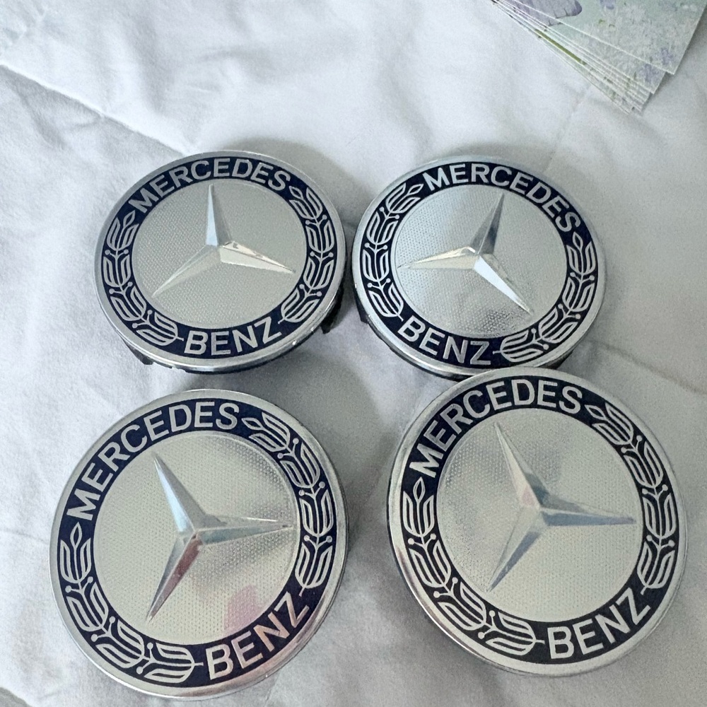 Mercedes-Benz Silver Wheel Center Caps.  4 brand new Mercedes wheel caps